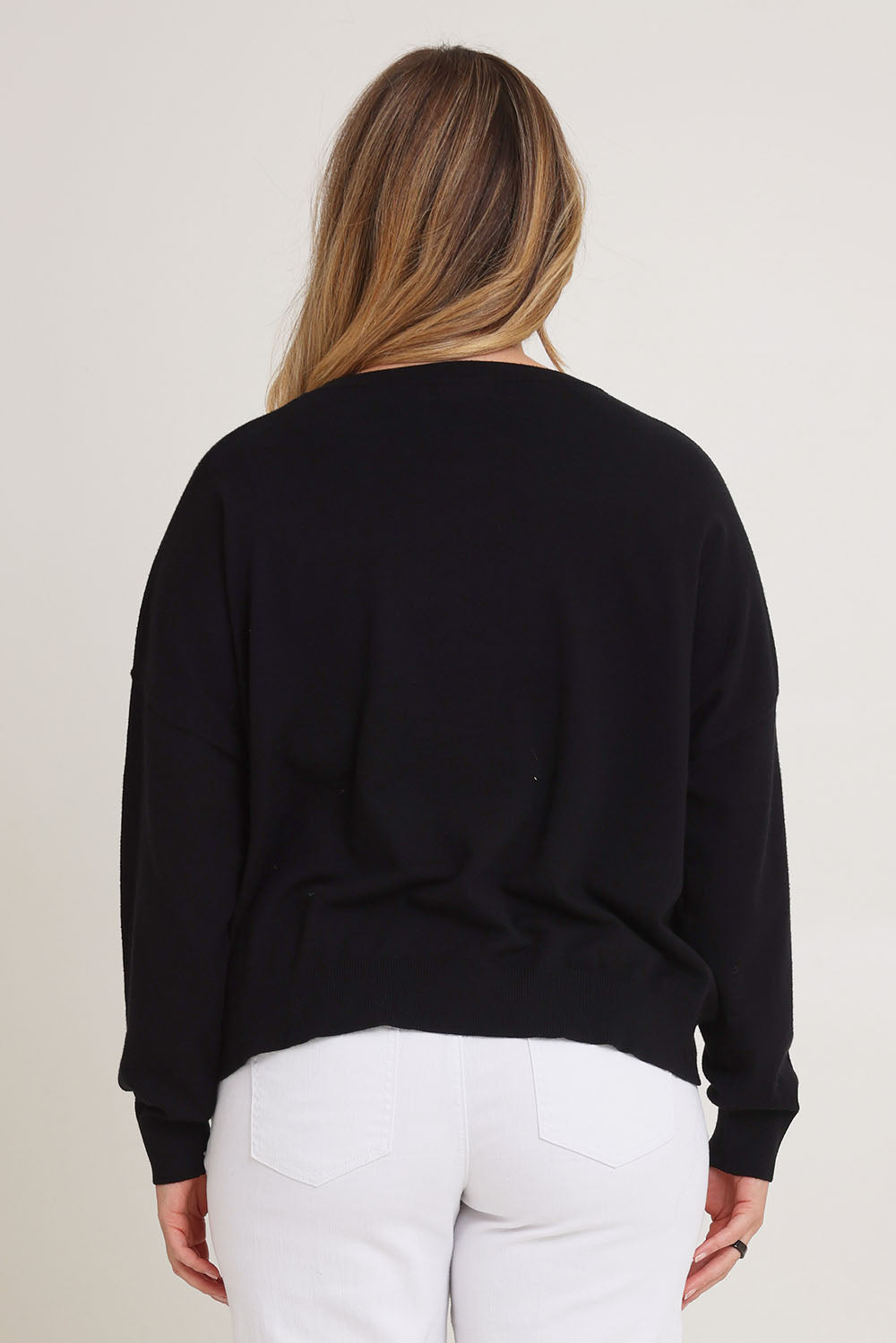 Model Chanel wearing size XL of The Essential Cropped Modal Blend Jumper in colour Black (Black), from the front, cropped image