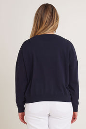 Model Chanel wearing size XL of The Essential Cropped Modal Blend Jumper in colour Navy (Blue), from the back
