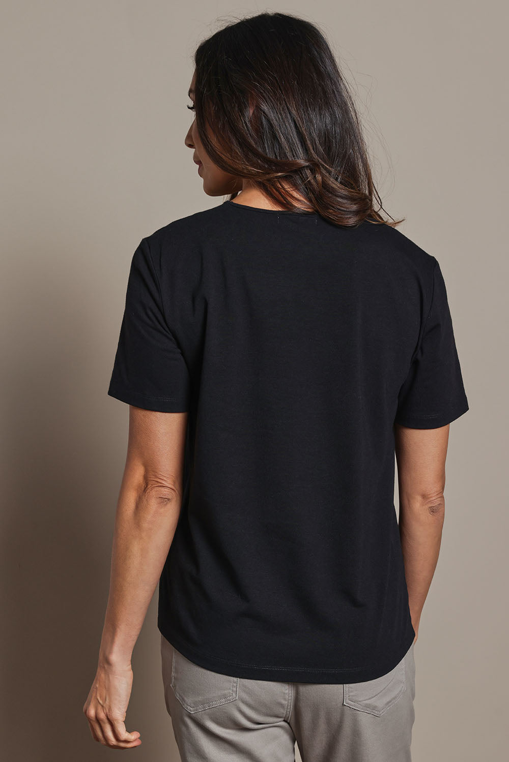 Model Amanda wearing size 10 of The Classic Cotton Blend Short Sleeve Tee in colour Black (Black), from the back