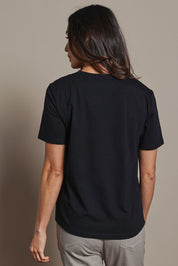 Model Amanda wearing size 10 of The Classic Cotton Blend Short Sleeve Tee in colour Black (Black), from the back