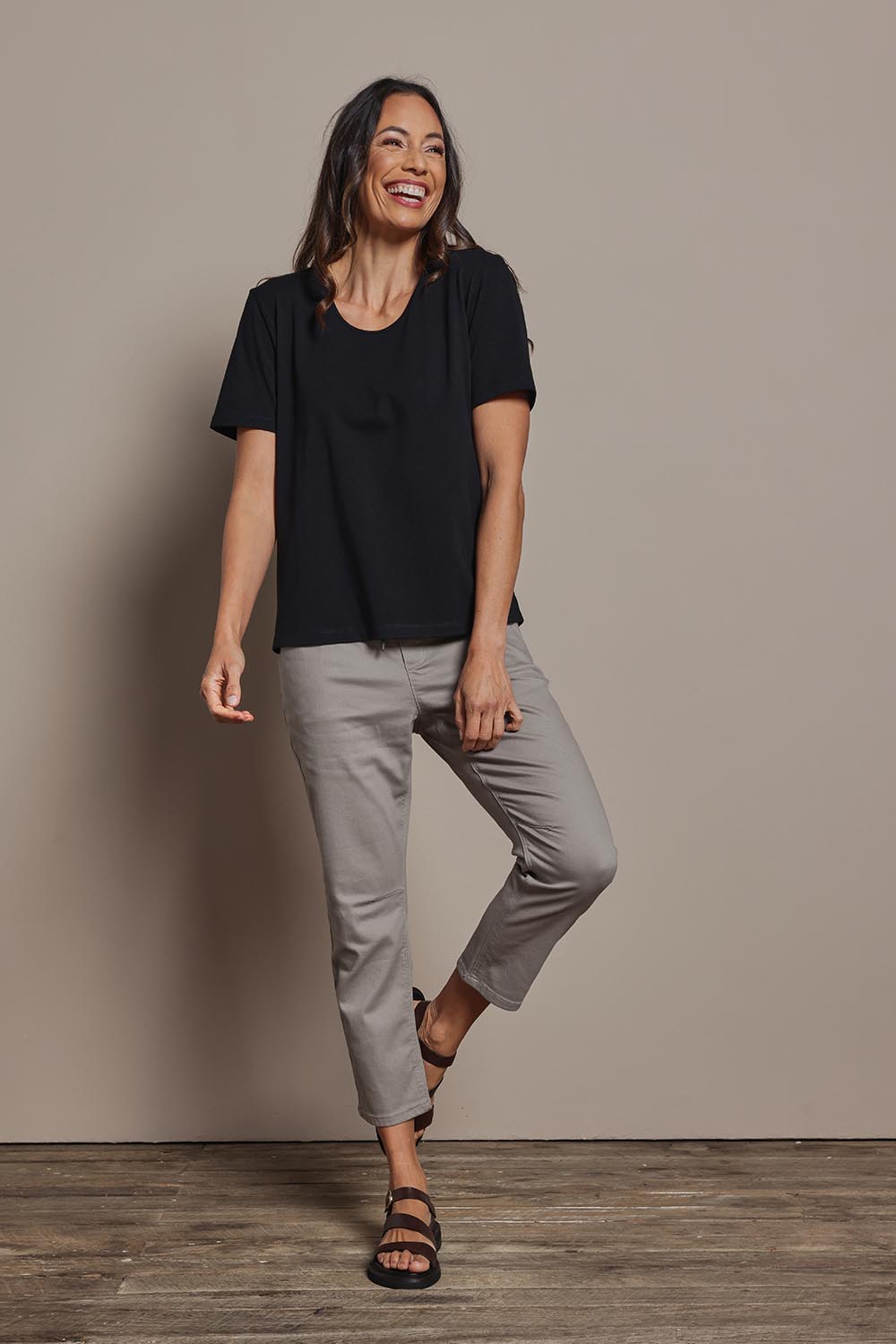 Model Amanda wearing size 10 of The Classic Cotton Blend Short Sleeve Tee in colour Black (Black), from the front, showing the whole outfit