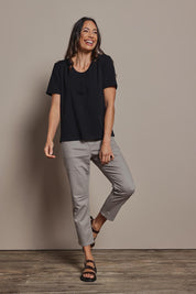 Model Amanda wearing size 10 of The Classic Cotton Blend Short Sleeve Tee in colour Black (Black), from the front, showing the whole outfit