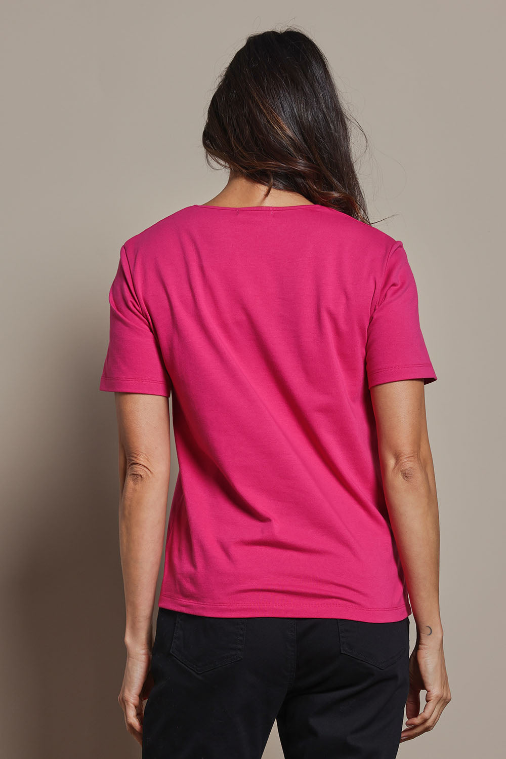 Model Amanda wearing size 10 of The Classic Cotton Blend Short Sleeve Tee in colour Blossom (Pink), from the back