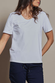Model Amanda wearing size 10 of The Classic Cotton Blend Short Sleeve Tee in colour White (White), from the front, cropped image