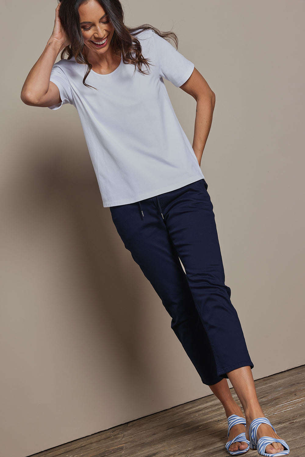 Model Amanda wearing size 10 of The Classic Cotton Blend Short Sleeve Tee in colour White (White), from the front, showing the whole outfit