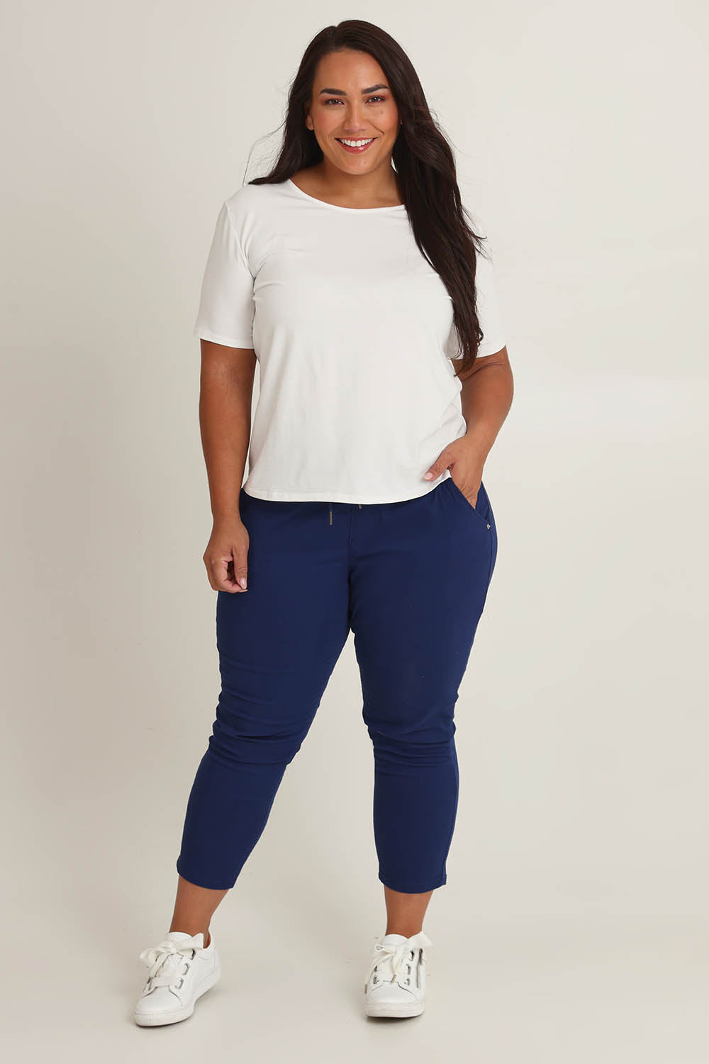 Model Ashleigh wearing size 16 of The Pull On Cotton Pant With Drawstring in colour Indigo (Blue), from the front, showing the whole outfit
