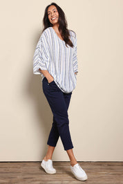 Model Amandam wearing size 10 of the The Pull On Cotton Pant With Drawstring – Navy in colour Navy, from the front