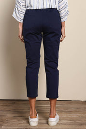 Model Amandam wearing size 10 of the The Pull On Cotton Pant With Drawstring – Navy in colour Navy, from the front