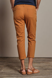 Model Amanda wearing size 10 of The Pull On Cotton Pant With Drawstring in colour Rust, from the back
