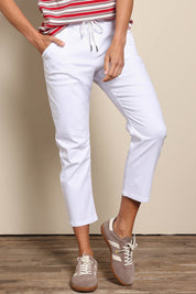 Model Amandam wearing size 10 of the The Pull On Cotton Pant With Drawstring – White in colour White, from an angle
