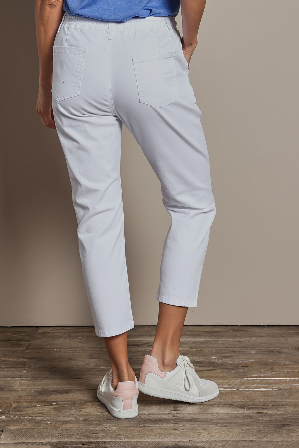 Model Amanda wearing size 10 of The Pull On Cotton Pant With Drawstring in colour White (White), from the back