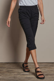 Model Amanda wearing size 10 of The Pull On Elastic Waist Cotton Blend Capri Pant in colour Black (Black), from the front, cropped image