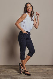 Model Amanda wearing size 10 of The Pull On Elastic Waist Cotton Blend Capri Pant in colour Navy (Blue), from the front, showing the whole outfit