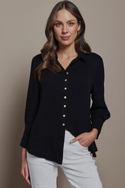 Model Madeline wearing size 10 of The Must Have Linen Look Shirt in colour Black (Black), from the front, cropped image