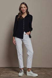 Model Madeline wearing size 10 of The Must Have Linen Look Shirt in colour Black (Black), from the front, showing the whole outfit