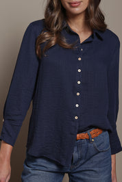 Model Madeline wearing size 10 of The Must Have Linen Look Shirt in colour Navy (Blue), from the front, cropped image
