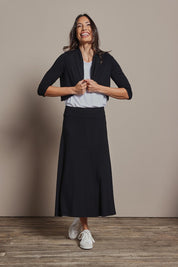 Model Amanda wearing size 10 of The Mix Me Match Me Bamboo Shrug in colour Black (Black), from the front, showing the whole outfit