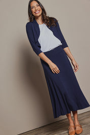 Model Amanda wearing size 10 of The Mix Me Match Me Bamboo Shrug in colour Darknavy (Blue), from the front, showing the whole outfit