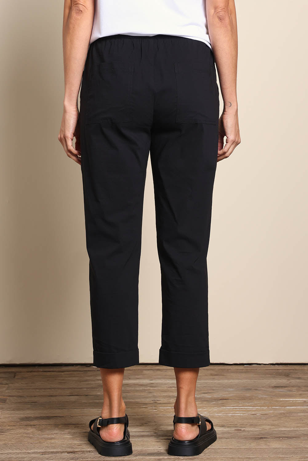 Model Amandam wearing size 10 of the The Elastic Waist Pull On Patch Pocket Pant – Black in colour Black, from the back