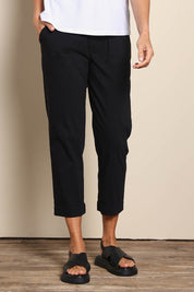 Model Amandam wearing size 10 of the The Elastic Waist Pull On Patch Pocket Pant – Black in colour Black, in a cropped view