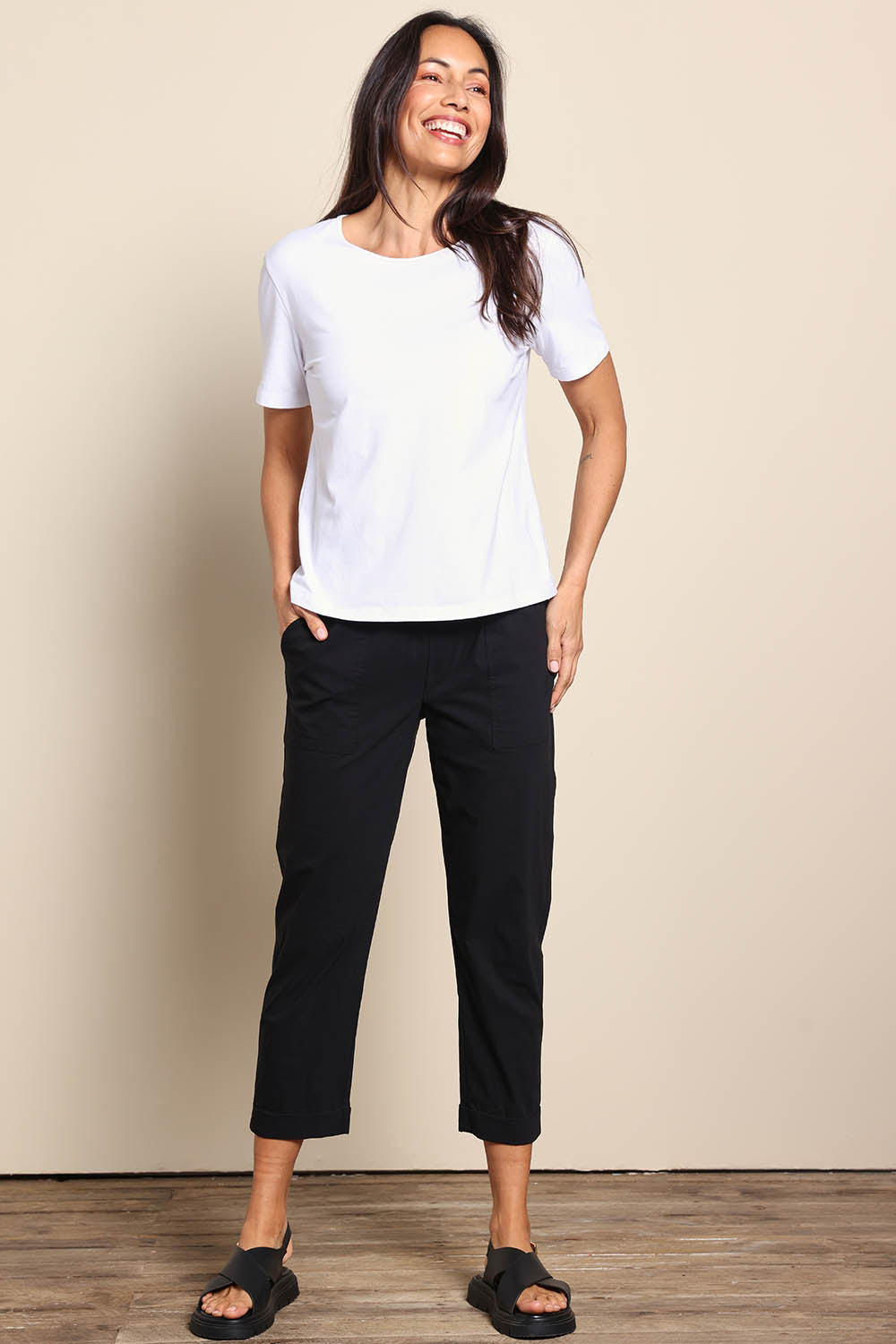 Model Amandam wearing size 10 of the The Elastic Waist Pull On Patch Pocket Pant – Black in colour Black, from the front