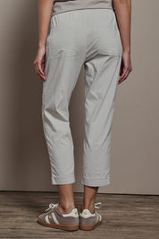 Model Madeline wearing size 10 of The Elastic Waist Pull On Patch Pocket Pant in colour Pummice, from the back