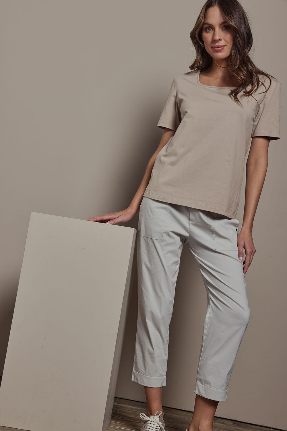 Model Madeline wearing size 10 of The Elastic Waist Pull On Patch Pocket Pant in colour Pummice, from the front, showing the whole outfit