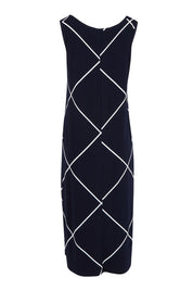 Product shot of The Easy Wear Printed Tank Dress in colour Navywhite (Blue), from the back