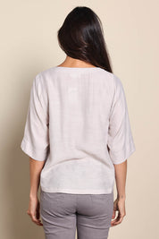 Model Amandam wearing size 10 of the The Popover Cotton Blend Boat Neck Top – Natural in colour Natural, from the back