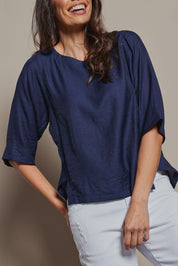 Model Amanda wearing size 10 of The Popover Cotton Blend Boat Neck Top in colour Navy (Blue), from the front, cropped image