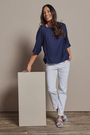 Model Amanda wearing size 10 of The Popover Cotton Blend Boat Neck Top in colour Navy (Blue), from the front, showing the whole outfit