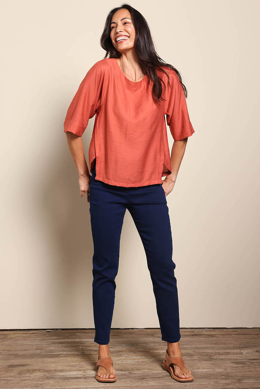 Model Amandam wearing size 10 of the The Popover Cotton Blend Boat Neck Top – Rust in colour Rust, from the front