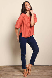 Model Amandam wearing size 10 of the The Popover Cotton Blend Boat Neck Top – Rust in colour Rust, from the front