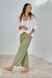 Model Amanda wearing size 10 of The Must Have Linen Look Pull on Pant in colour Kkahi (Green), from the front, showing the whole outfit