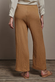 Model Madeline wearing size 10 of The Must Have Linen Look Pull on Pant in colour Latte, from the back