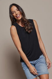 Model Amanda wearing size 10 of The Mix Me Match Me Bamboo Tank in colour Black (Black), from the front, cropped image
