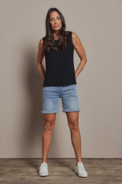 Model Amanda wearing size 10 of The Mix Me Match Me Bamboo Tank in colour Black (Black), from the front, showing the whole outfit