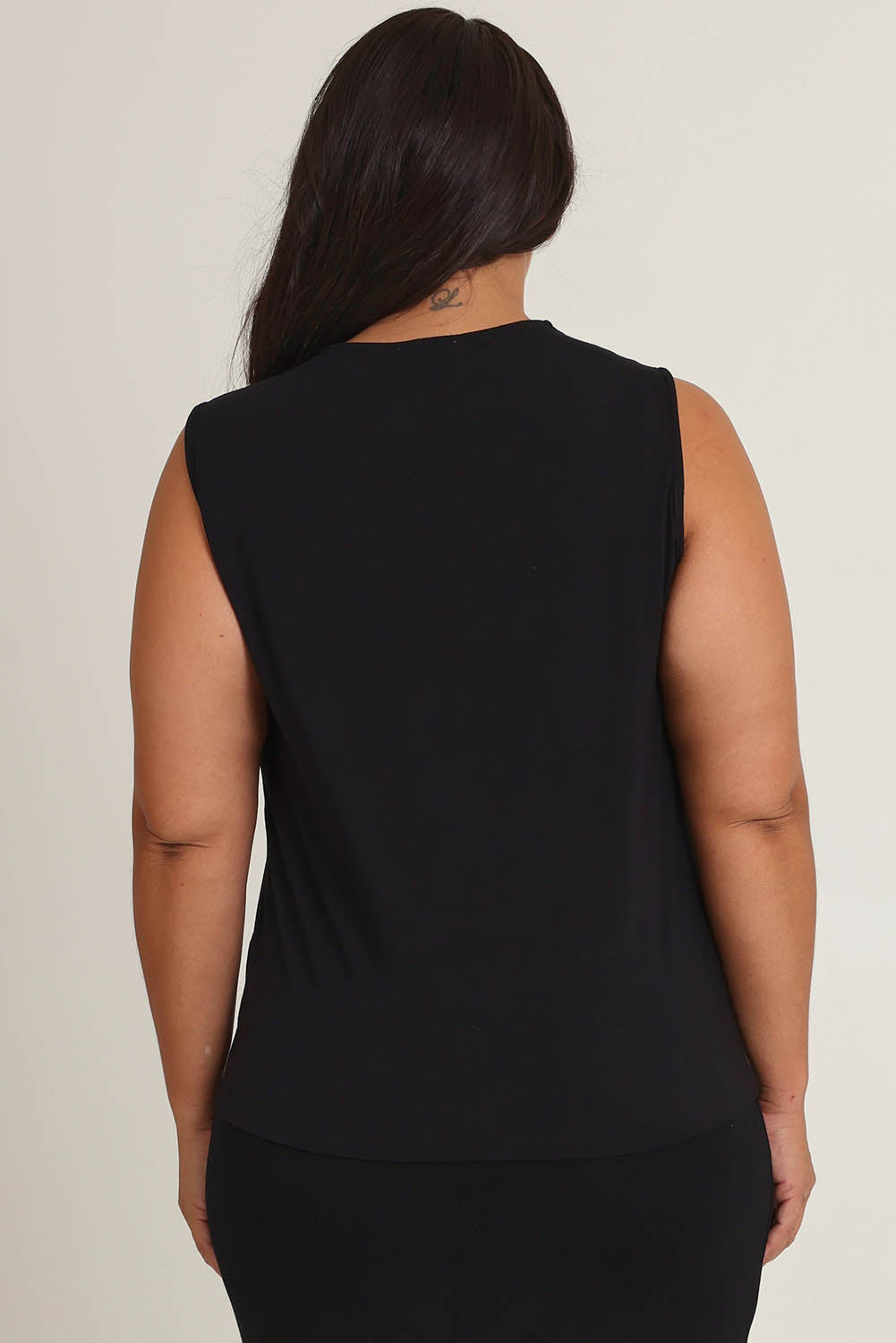 Model Ashleigh wearing size 16 of The Mix Me Match Me Bamboo Tank in colour Black (Black), from the back