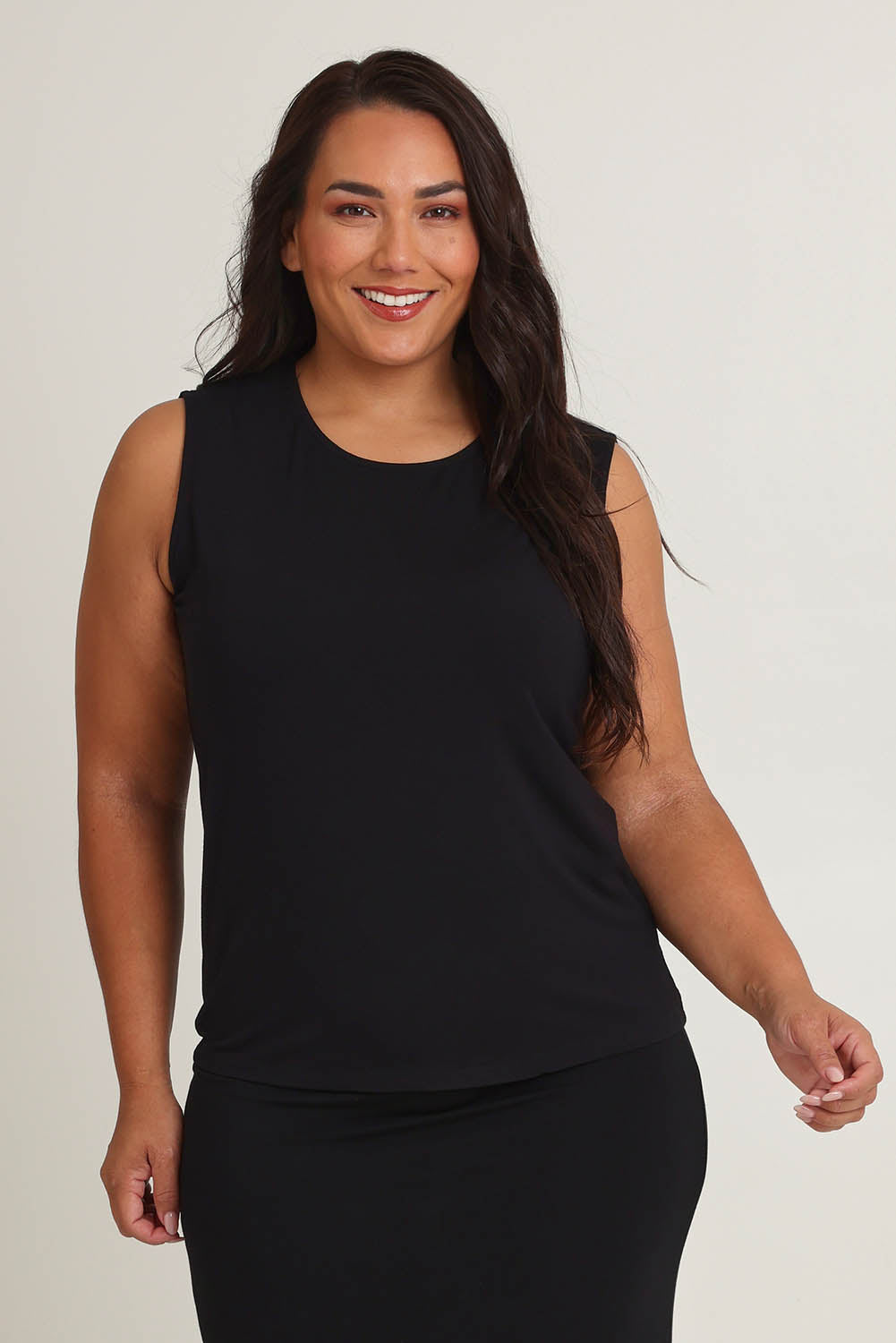 Model Ashleigh wearing size 16 of The Mix Me Match Me Bamboo Tank in colour Black (Black), from the front, cropped image
