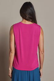 Model Amanda wearing size 10 of The Mix Me Match Me Bamboo Tank in colour Cerise (Pink), from the back