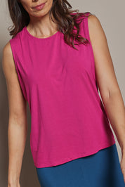 Model Amanda wearing size 10 of The Mix Me Match Me Bamboo Tank in colour Cerise (Pink), from the front, cropped image