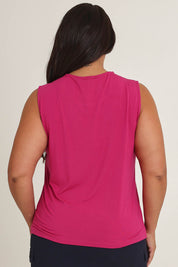 Model Ashleigh wearing size 14 of The Mix Me Match Me Bamboo Tank in colour Cerise (Pink), from the back