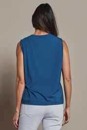 Model Amanda wearing size 10 of The Mix Me Match Me Bamboo Tank in colour Marine (Blue), from the back