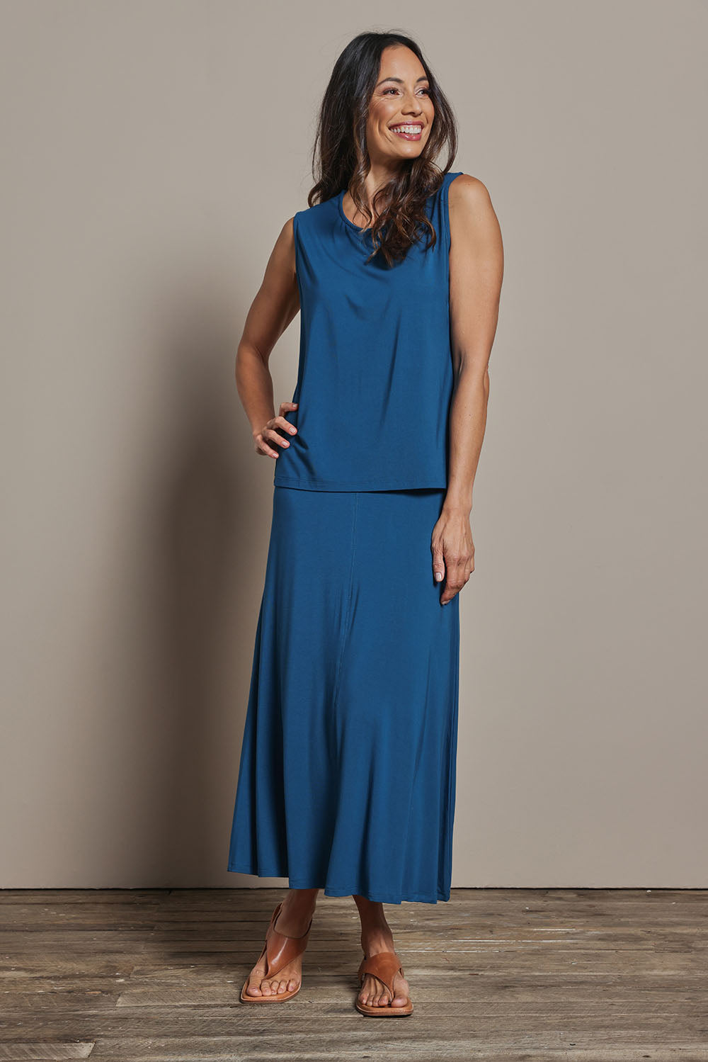 Model Amanda wearing size 10 of The Mix Me Match Me Bamboo Tank in colour Marine (Blue), from the front, showing the whole outfit