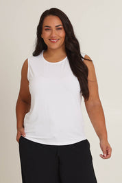 Model Ashleigh wearing size 16 of The Mix Me Match Me Bamboo Tank in colour White (White), from the front, cropped image
