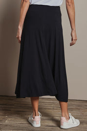 Model Amanda wearing size 10 of The Mix Me Match Me Bamboo Full Skirt in colour Black (Black), from the back