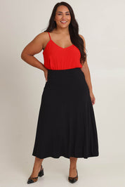 Model Ashleigh wearing size 14 of The Mix Me Match Me Bamboo Full Skirt in colour Black (Black), from the front, showing the whole outfit