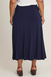 Model Ashleigh wearing size 16 of The Mix Me Match Me Bamboo Full Skirt in colour Darknavy (Blue), from the back