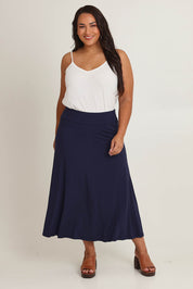 Model Ashleigh wearing size 16 of The Mix Me Match Me Bamboo Full Skirt in colour Darknavy (Blue), from the front, showing the whole outfit