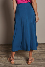 Model Amanda wearing size 10 of The Mix Me Match Me Bamboo Full Skirt in colour Marine (Blue), from the back